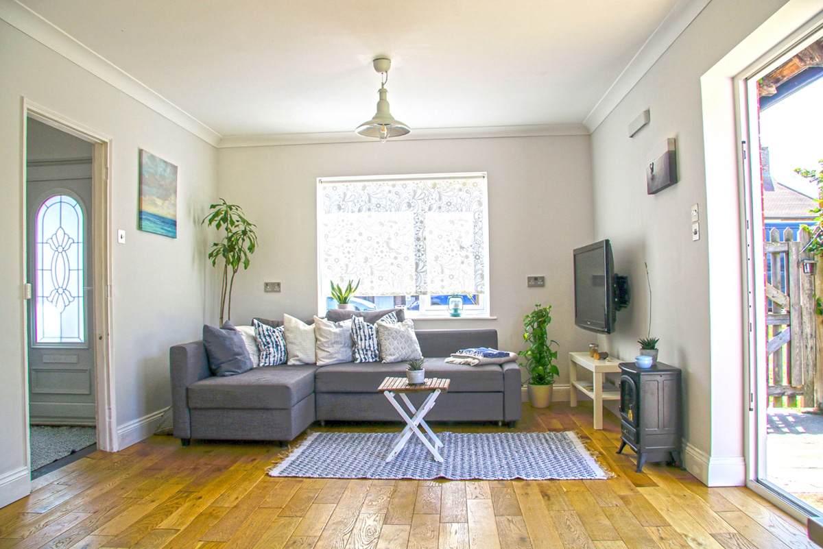 Win-My-Beach-Home_Living_Room_Overview